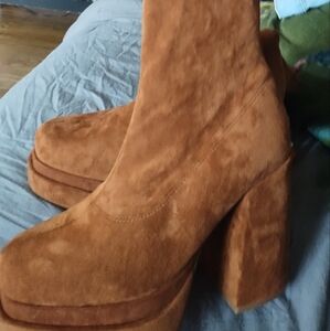New with tags.Knee high suede platform boots